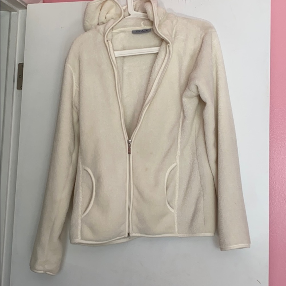 a white fuzzy jacket